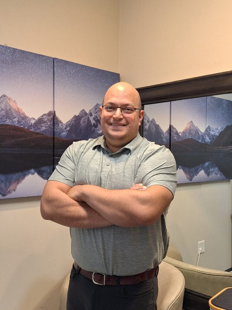 Licensed massage therapist performing trauma-informed massage in Pleasant Grove, Utah